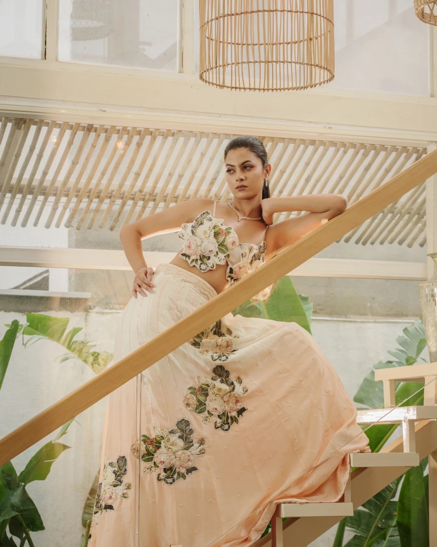 Floral-era lehenga style with 3D floral effect, orange dupatta with floral patch work