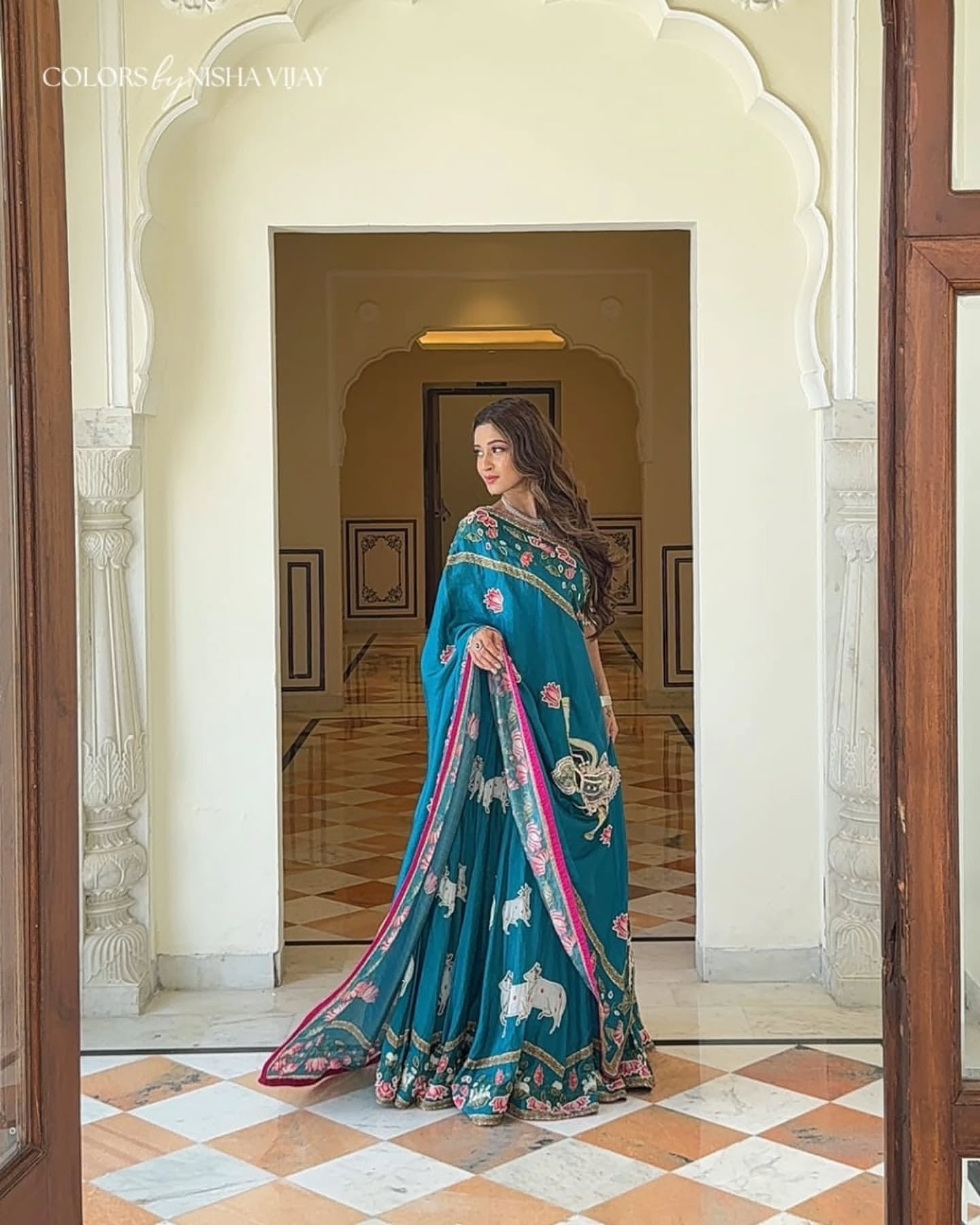 Pichwai-theme lehenga with Shrinathji figure motif; cow print on lehenga; full-flare lehenga