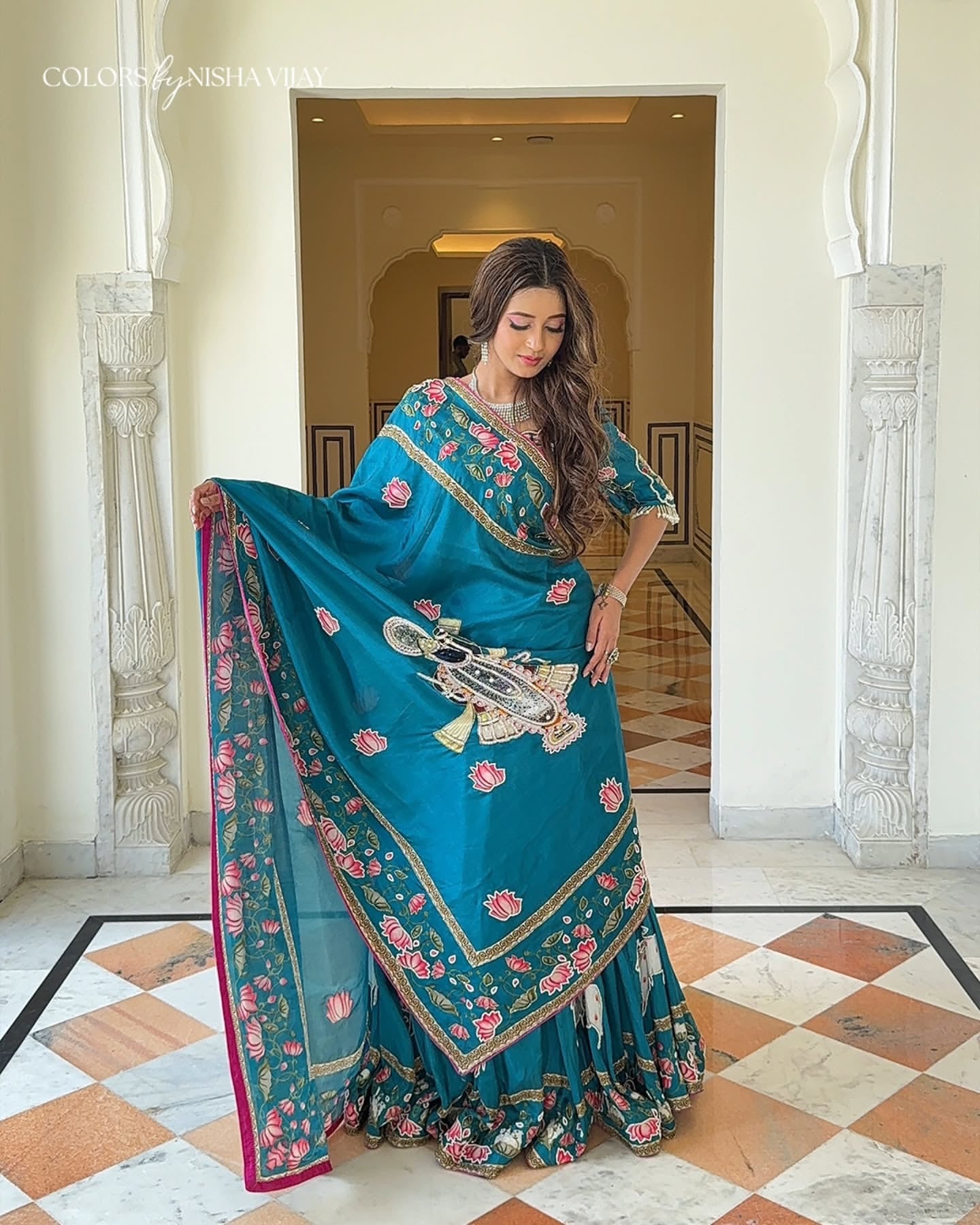 Pichwai-theme lehenga with Shrinathji figure motif; cow print on lehenga; full-flare lehenga