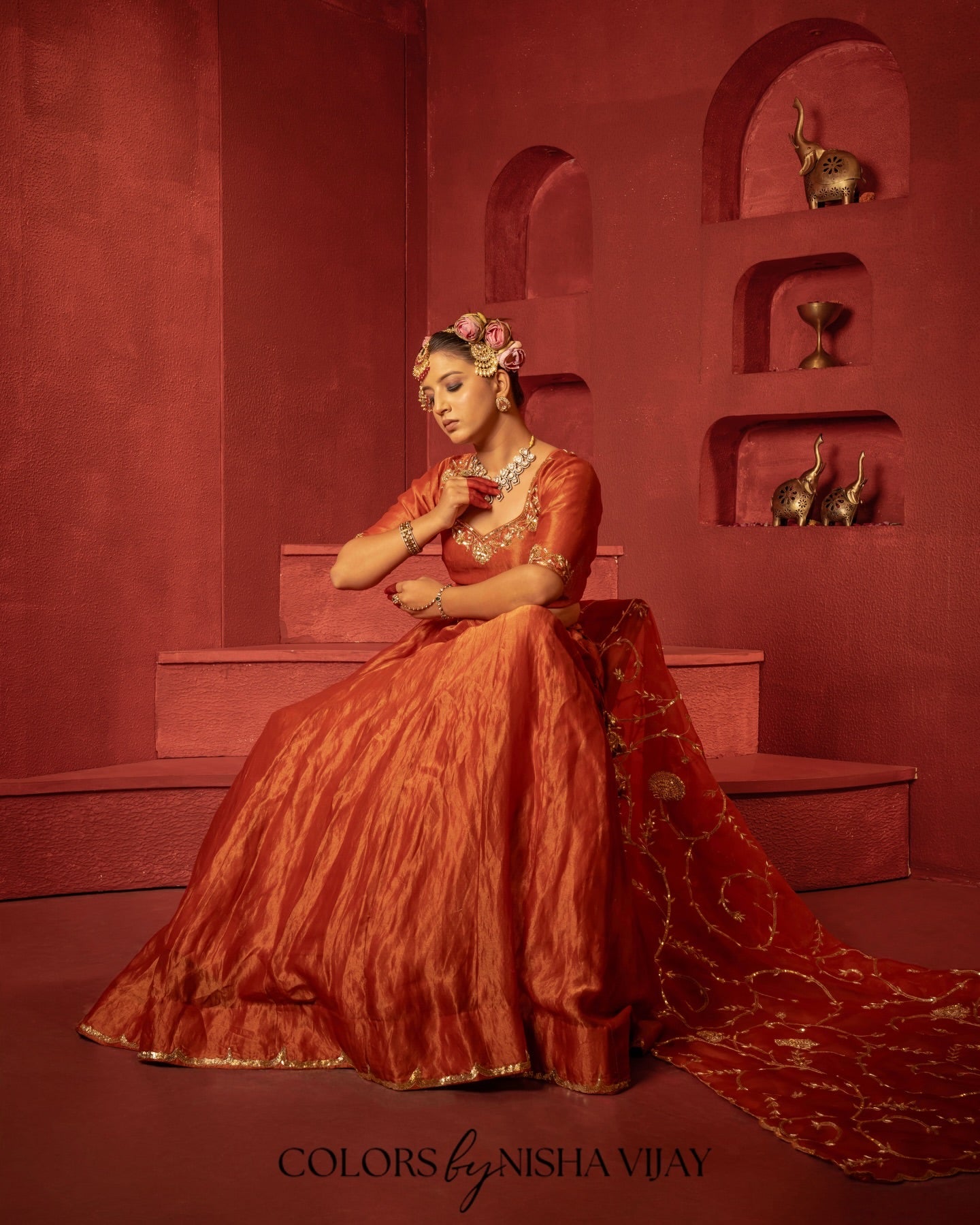 Tissue-fabric lehenga with vintage jaal / aari-taari embroidery; contrast (orange) dupatta