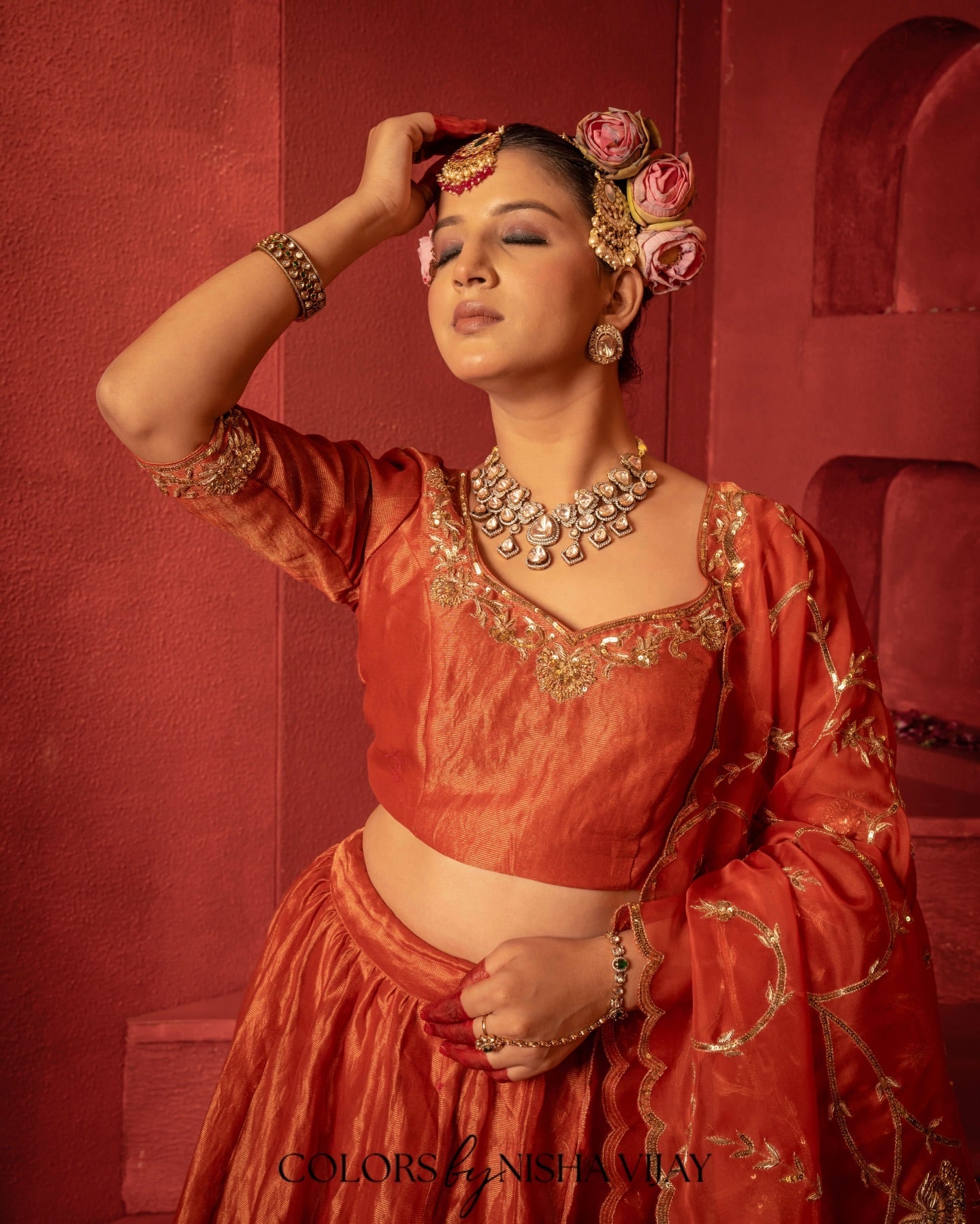 Tissue-fabric lehenga with vintage jaal / aari-taari embroidery; contrast (orange) dupatta