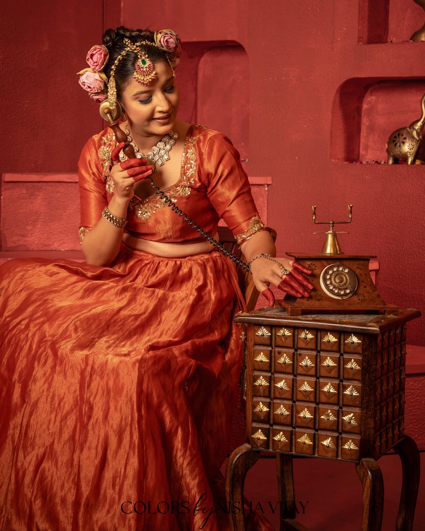Tissue-fabric lehenga with vintage jaal / aari-taari embroidery; contrast (orange) dupatta