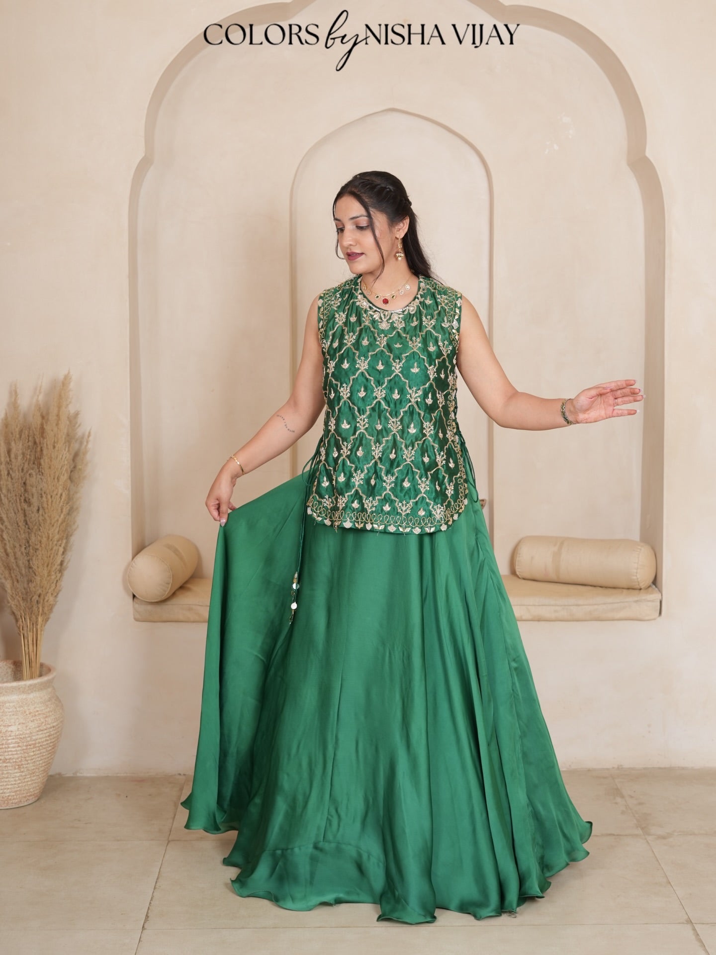 Cap-style blouse; "Add cross" pattern lehenga