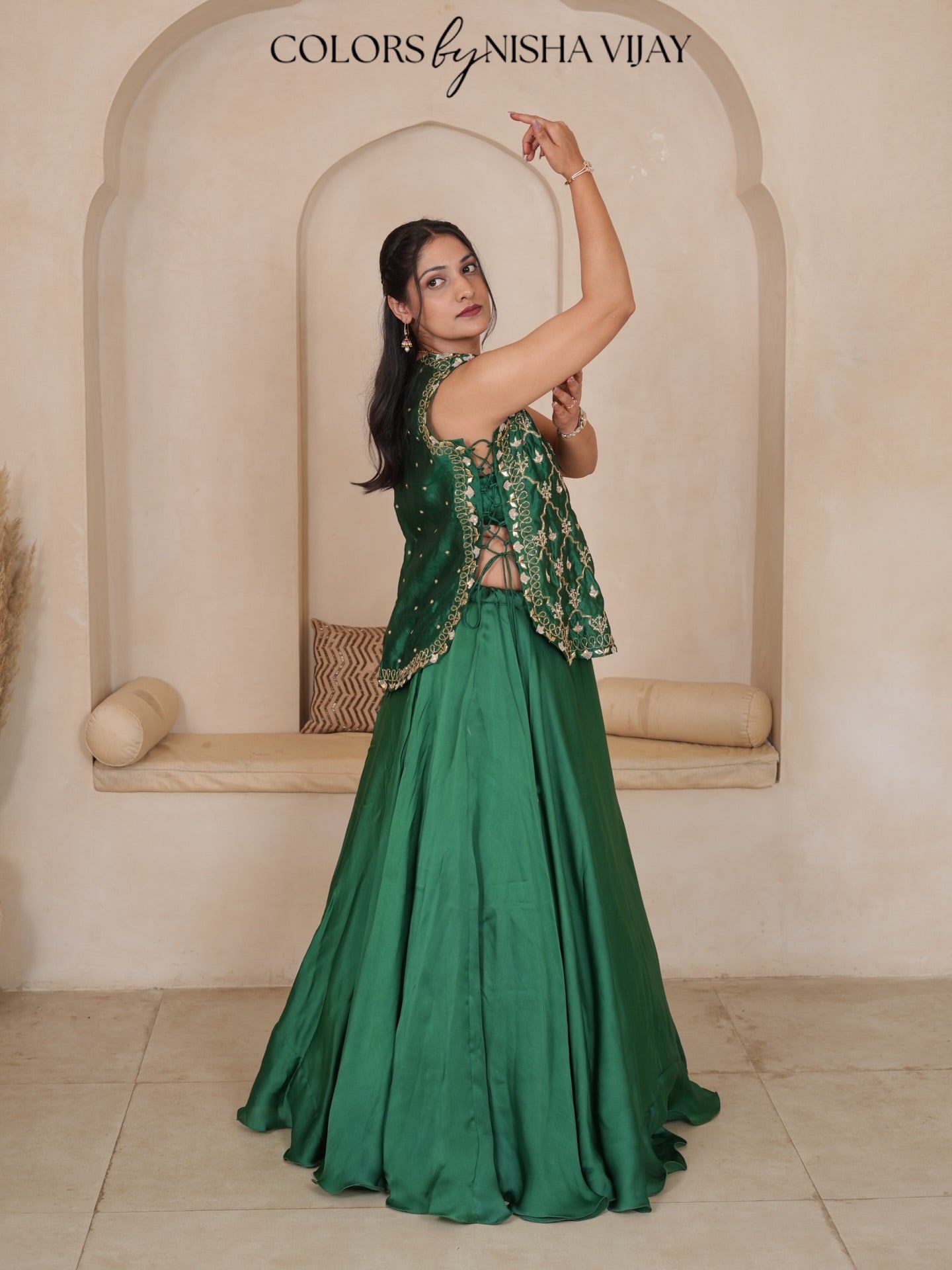 Cap-style blouse; "Add cross" pattern lehenga