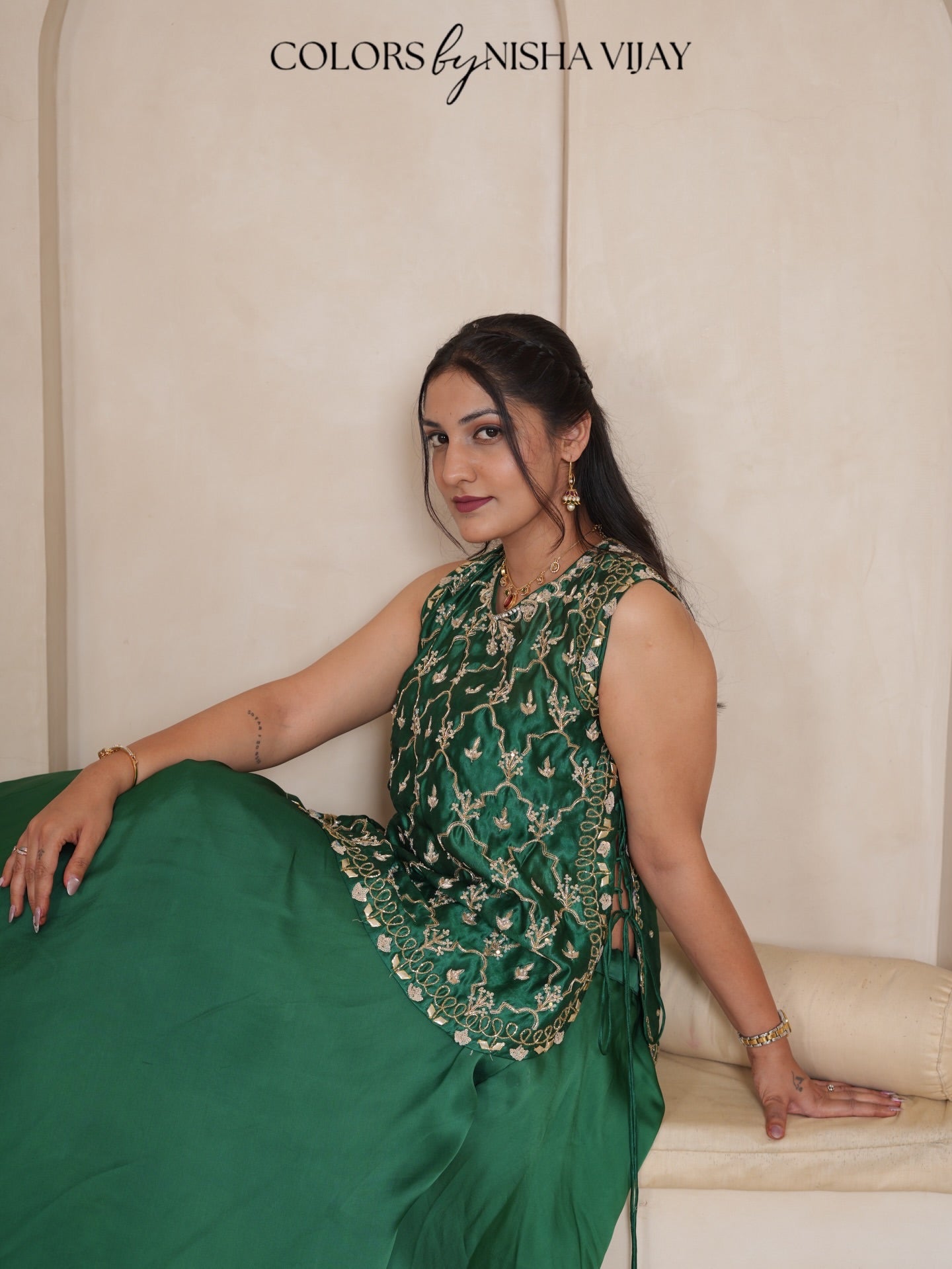 Cap-style blouse; "Add cross" pattern lehenga